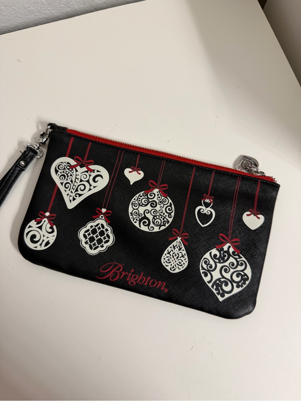 Brighton Christmas Black Wristlet Pouch with White Ornament Motifs and Red Trim
